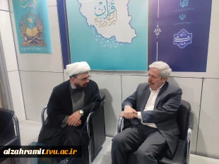 بازدید حجت‌الاسلام و المسلمین افتخاریان، رئیس اداره قرآن و عترت نهاد نمایندگی مقام معظم رهبری  از غرفه آموزشکده دختران الزهرا (س) مشهددر  سی و سومین نمایشگاه بین‌المللی قرآن کریم  2